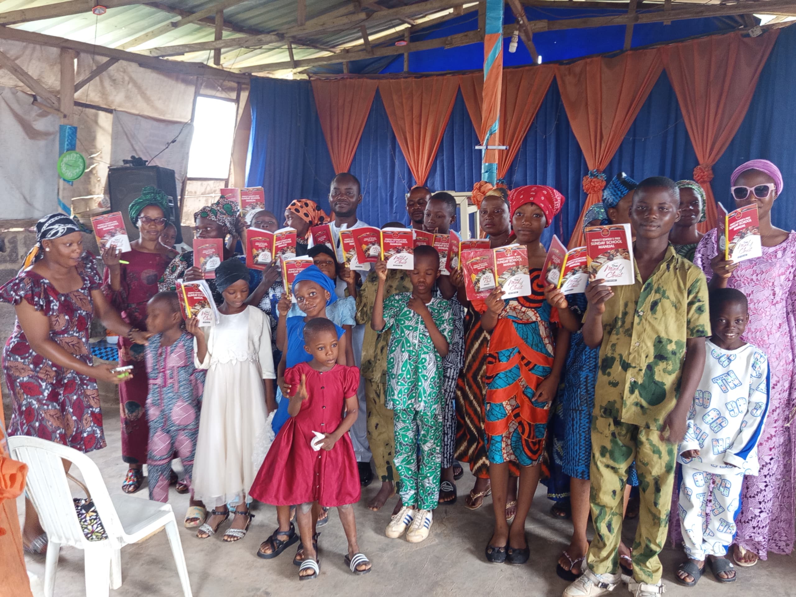 Children reading Christian books together
