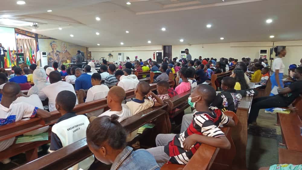 A full congregation gathered for a Perfect Edifiers Foundation conference and outreach crusade